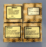 NIKON LOT OF x13 ACCESSORIES AR-4 AP-2 AH-2 DK-1 HK-6 MR-2 SC-14 MINT OPEN BOX