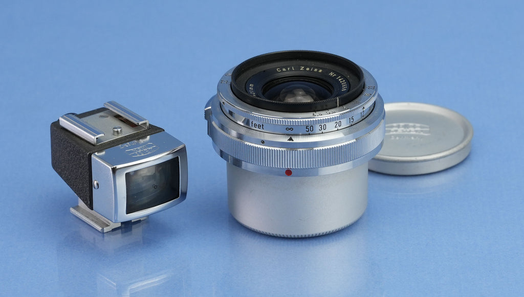 CONTAX CARL ZEISS BIOGON 21MM F4.5 ENTFERNEROBJEKTIV + DECKEL + SUCHER SEHR SCHÖN!