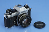 NIKON FA FILM SLR CAMERA BODY SILVER AUTO EXPOSURE +50mm F1.8 SERIES E LENS NICE