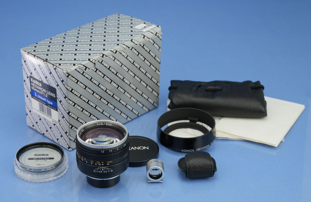 KONICA HEXANON 60MM F1.2 LEICA NOCTILUX OBJEKTIV + DECKEL + FILTER + BOX + SUCHER NEUWERTIGES SET