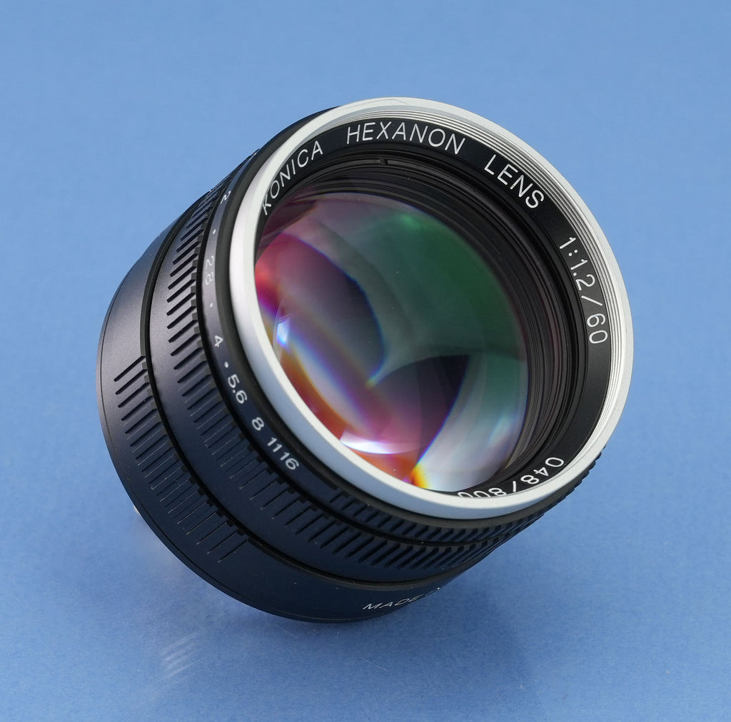 KONICA HEXANON 60MM F1.2 LEICA NOCTILUX OBJEKTIV + DECKEL + FILTER + BOX + SUCHER NEUWERTIGES SET
