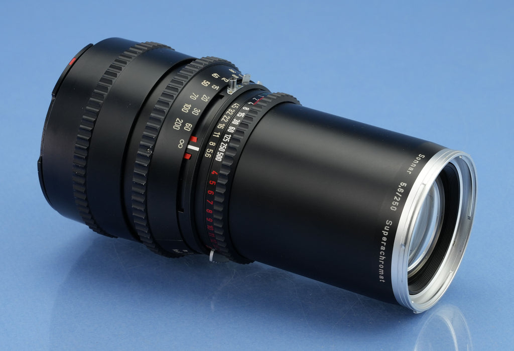 HASSELBLAD 250MM SONNAR SUPERACHROMAT CHROMRING F5.6 C OBJEKTIV + DECKEL NEUWERTIG UND SELTEN!
